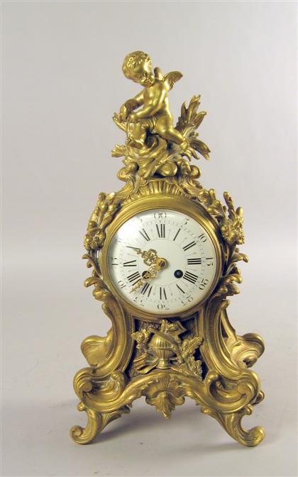 Appraisal: French gilt bronze mantel clock late th century With a