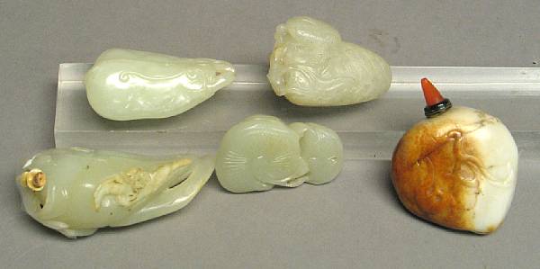 Appraisal: Four nephrite snuff bottles The first a well-hollowed bottle in