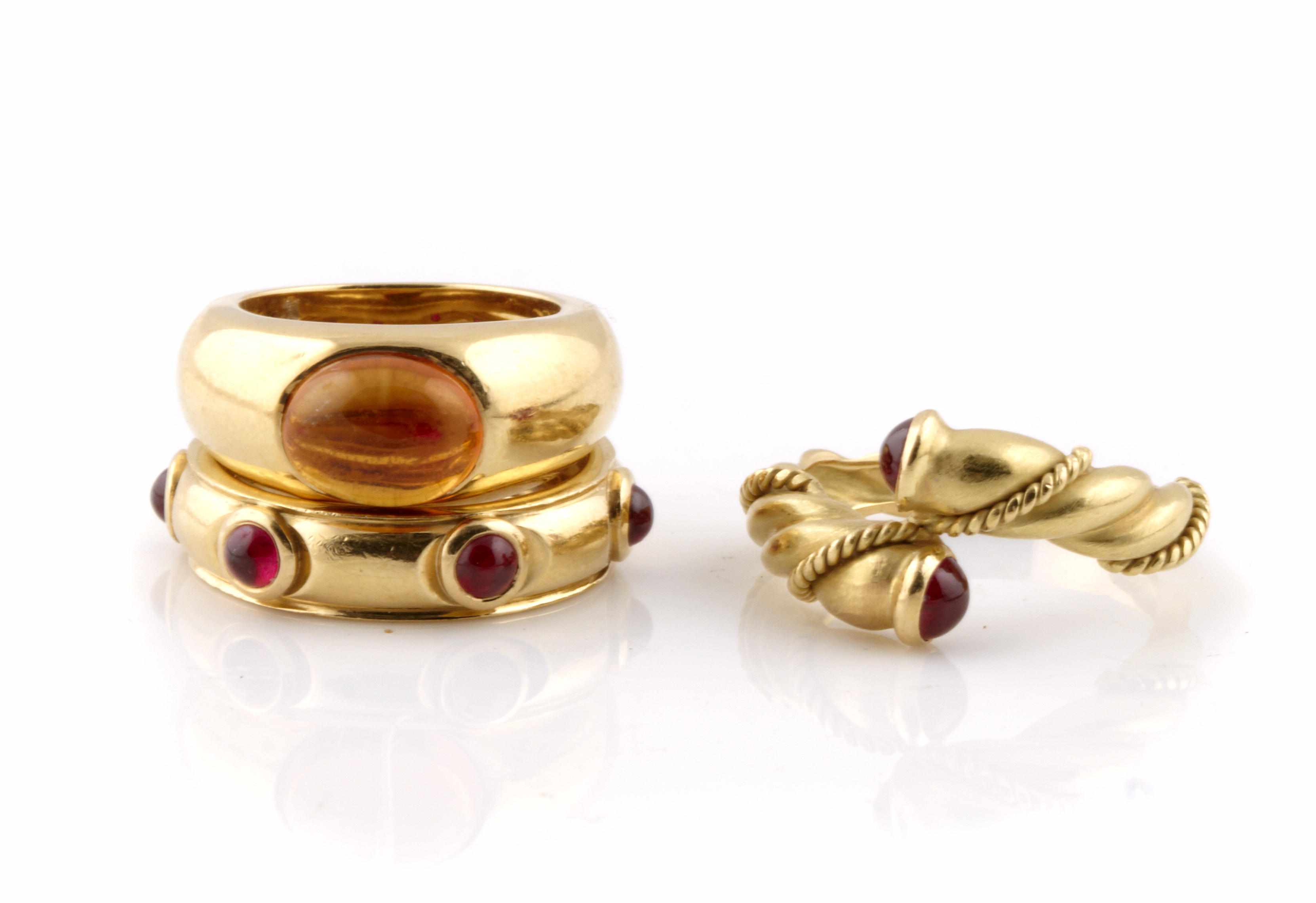 Appraisal: A group of three citrine ruby and k gold rings