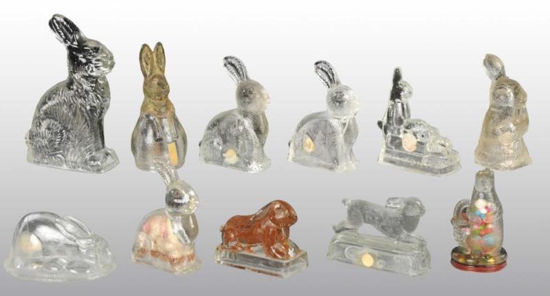 Appraisal: Lot of Glass Rabbit Candy Containers Description Includes five sitting