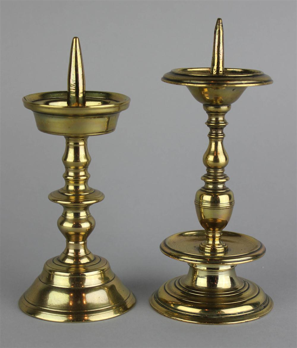 Appraisal: TWO CONTINENTAL SMALL BRASS PRICKET STICKS the first with angular