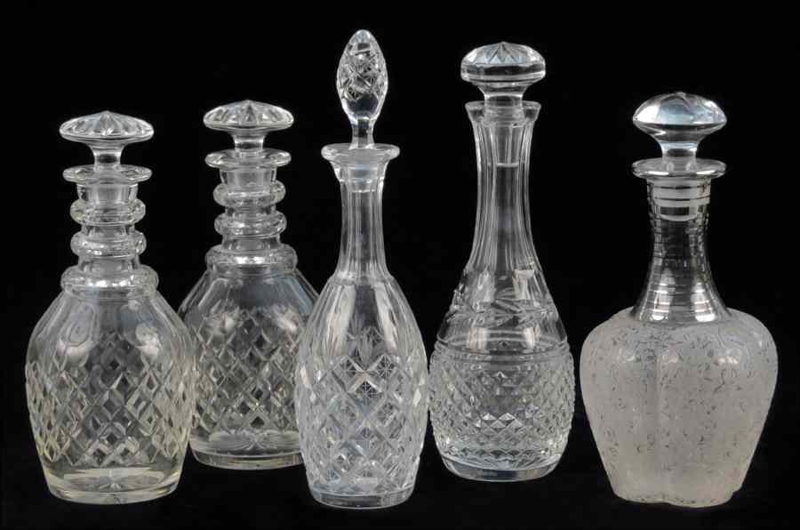 Appraisal: PAIR OF CRYSTAL DECANTERS Together with a Waterford crystal decanter