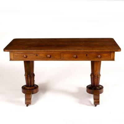 Appraisal: A William IV rosewood writing table with two short drawers