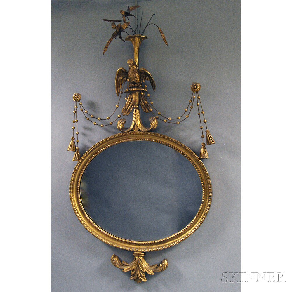 Appraisal: Gilt and Carved Federal-style Mirror the carved eagle and flowering