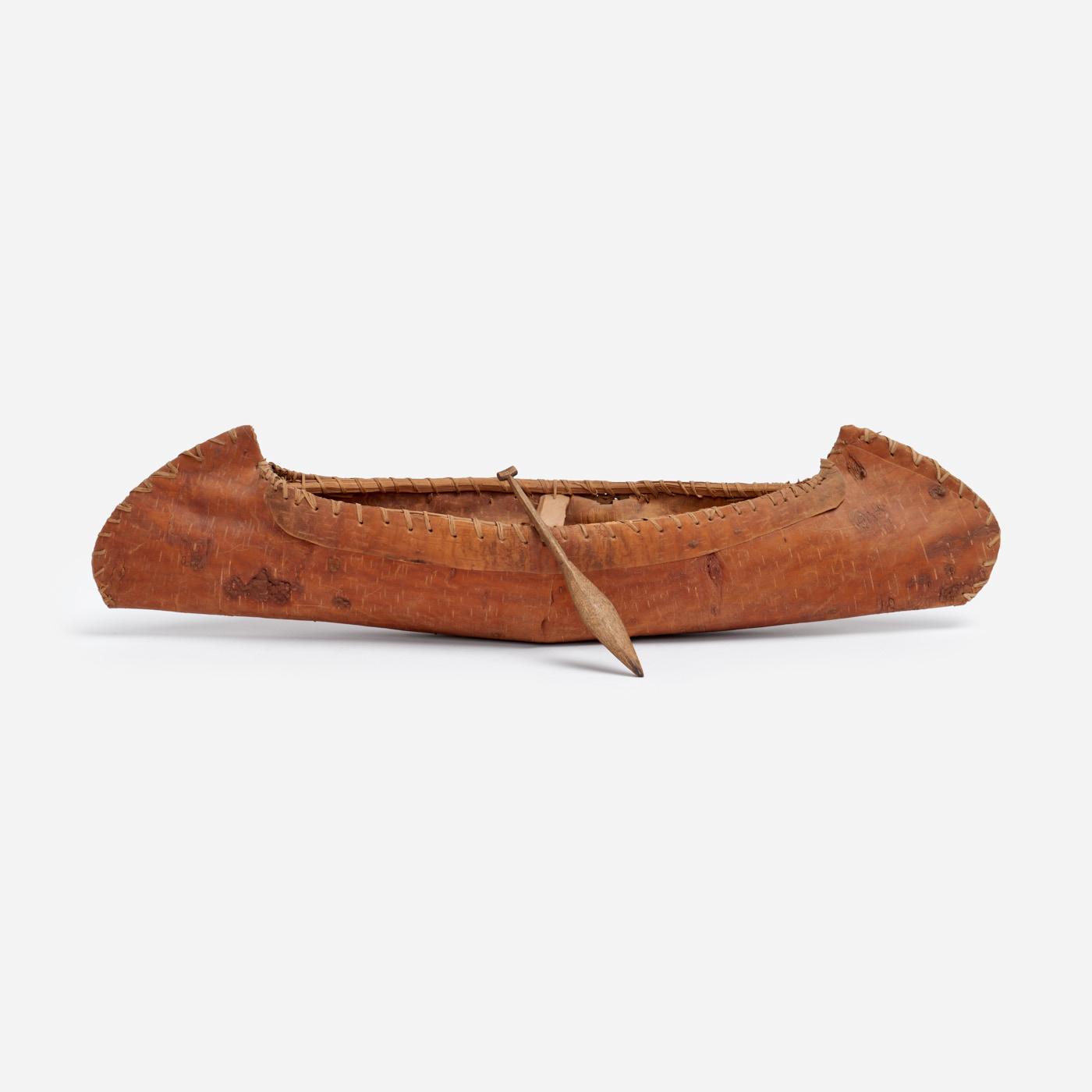 Appraisal: BIRCH BARK CANOE MODEL LENGTH A canoe model handcrafted from