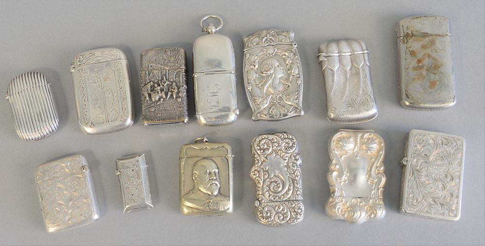 Appraisal: Thirteen silver holders to include match safes with coin holder