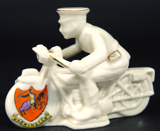 Appraisal: Arcadian military crested china model of a motorcycle despatch rider