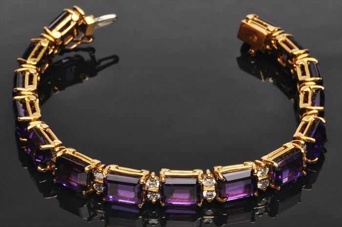 Appraisal: AMETHYST AND DIAMOND BRACELET Stamped k in