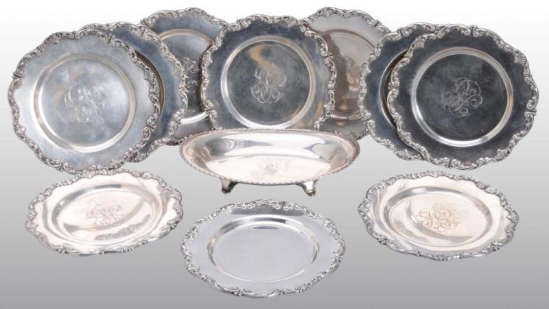 Appraisal: Set of Silver Butter Plates Oval Tray Description Weighs troy