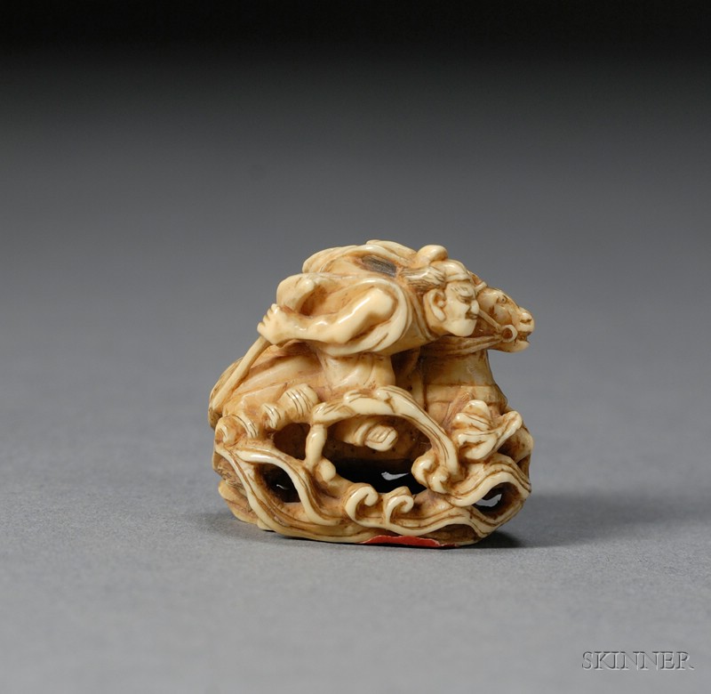 Appraisal: Ivory Netsuke th century a rider galloping a horse through