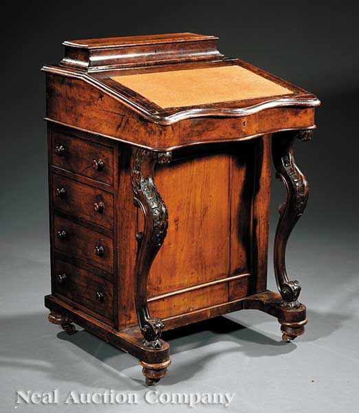 Appraisal: An English Carved Walnut Davenport Desk mid- th c serpentine