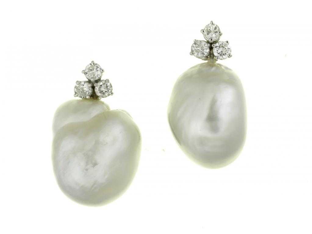 Appraisal: A PAIR OF DIAMOND AND BAROQUE PEARL EARRINGS the irregular