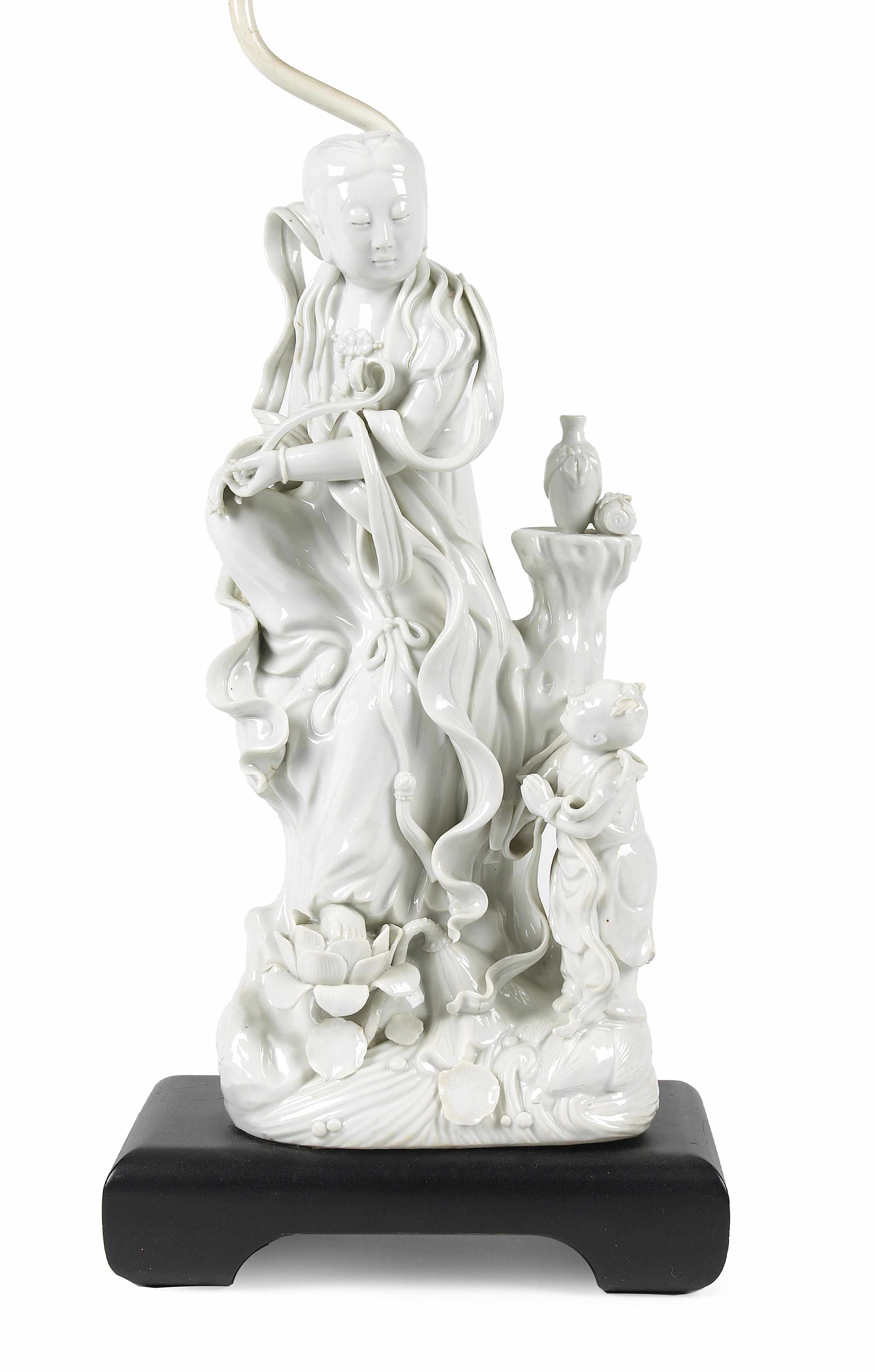 Appraisal: A Dehua porcelain Guanyin and child mounted as a lamp