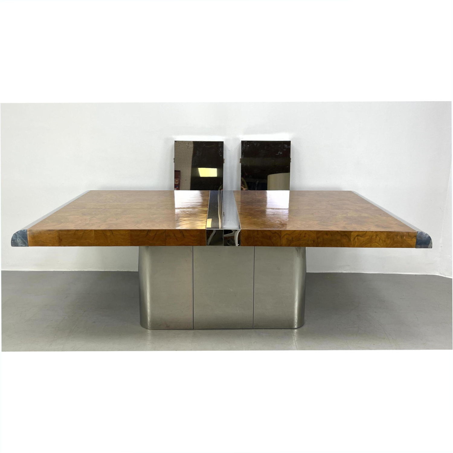 Appraisal: PAUL EVANS Burl and Chrome Dining Table with Leaves Unmarked