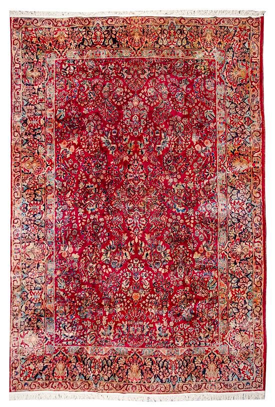 Appraisal: A Sarouk Wool Rug feet inches x feet inches A