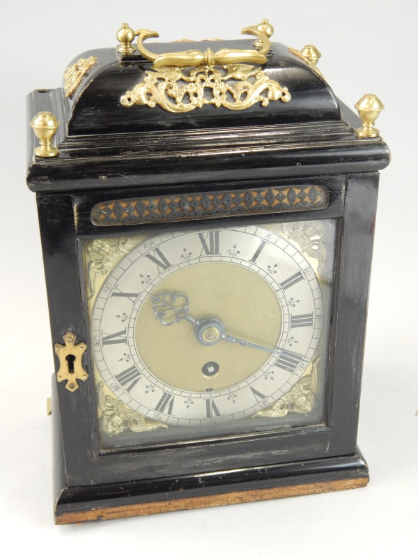 Appraisal: An ebonised bracket timepiece the brass dial with silver chapter