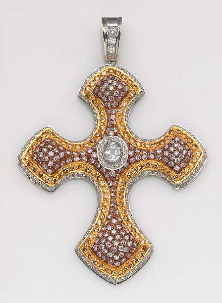 Appraisal: A colored diamond diamond and eighteen karat tricolor gold cruciform