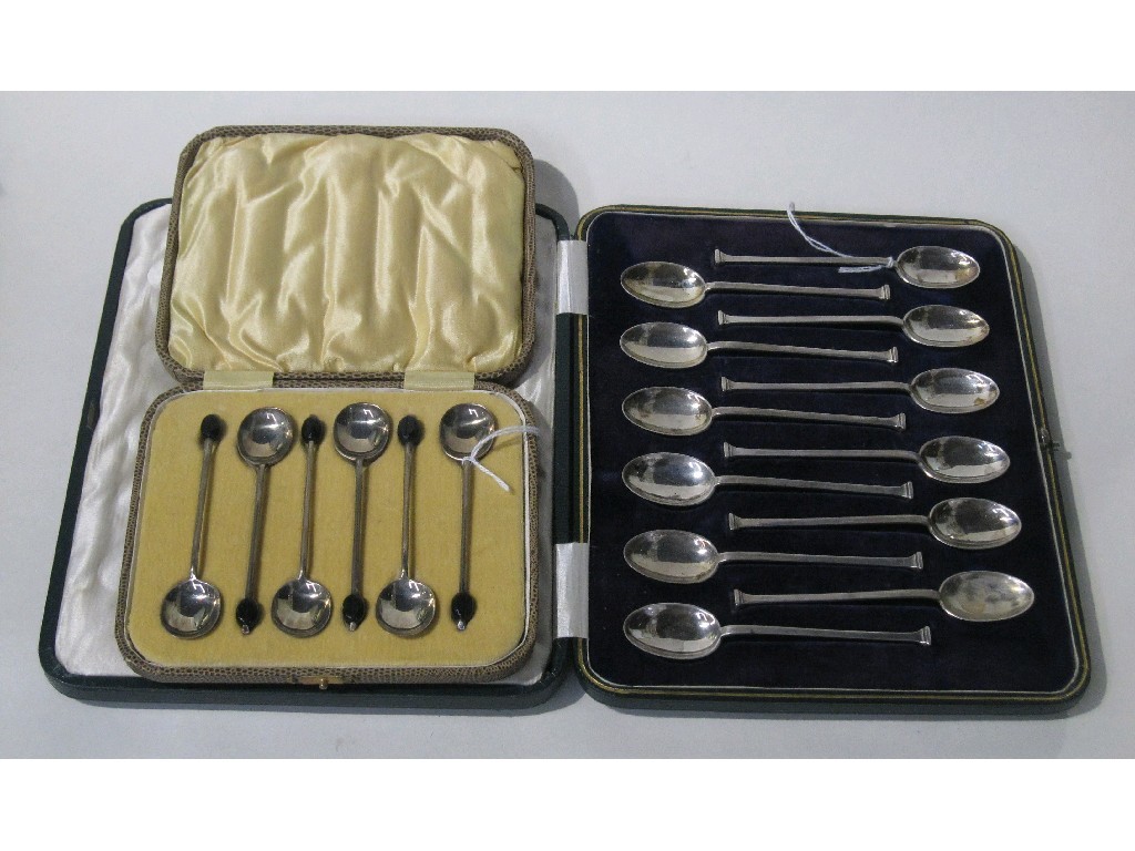 Appraisal: Lot comprising cased set of twelve silver coffee spoons and