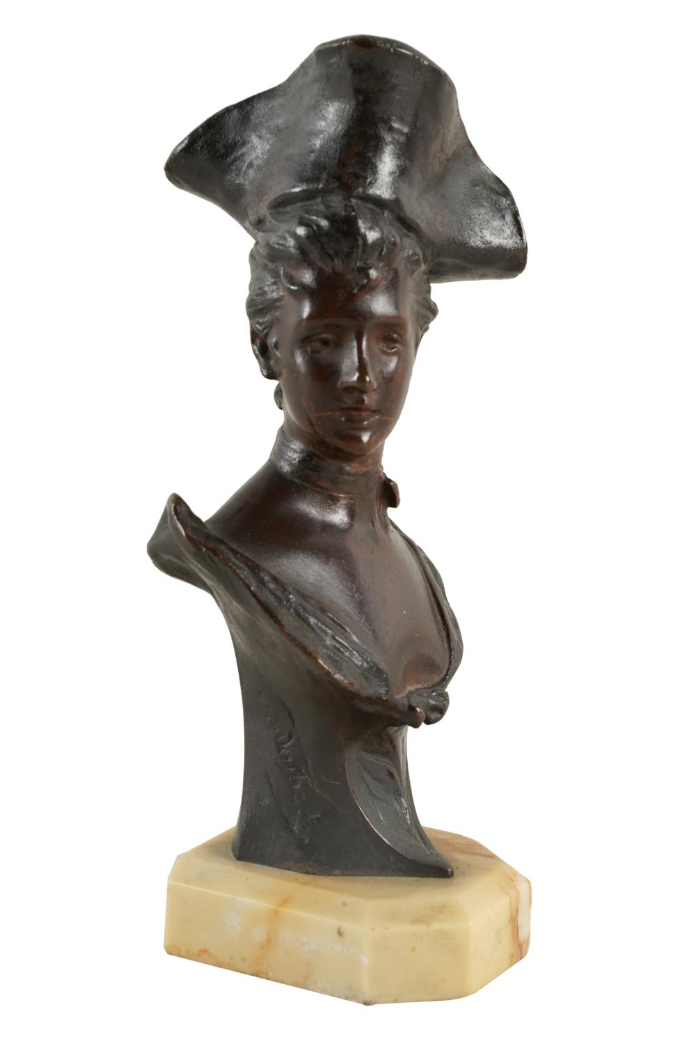 Appraisal: BRONZE BUST OF A WOMANsigned illegibly in casting with illegible