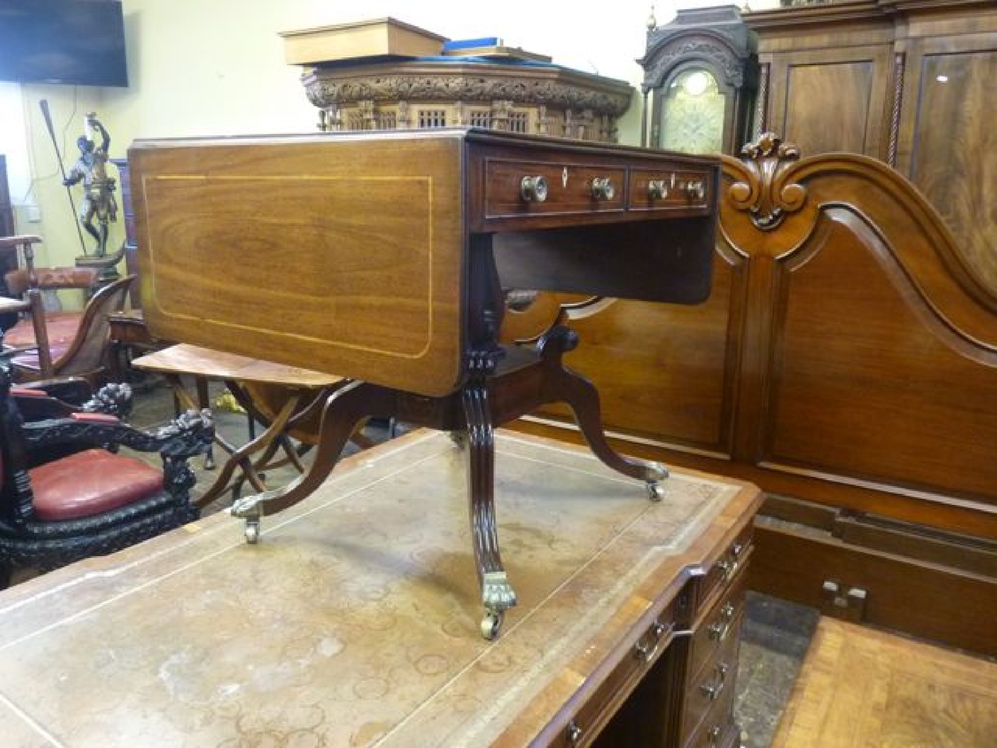 Appraisal: A Regency mahogany sofa table of usual form the top