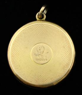 Appraisal: Gold locket inset with portrait of a lady the case