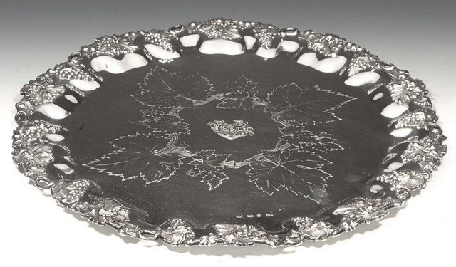 Appraisal: A VICTORIAN SILVER SALVER with cast grapevine border and the