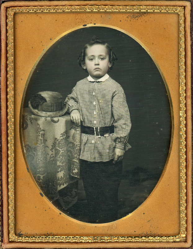 Appraisal: QUARTER PLATE CHILDREN DAGUERREOTYPES Boy with nose up wearing a