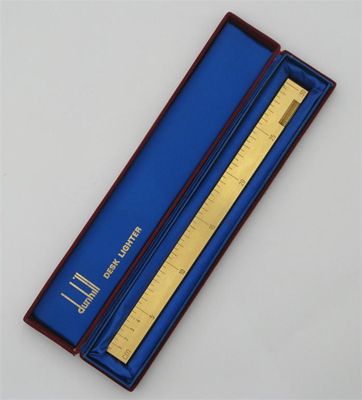 Appraisal: A Dunhill novelty desk lighter modelled as a ruler in