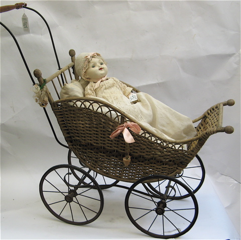 Appraisal: TWO GIRL DOLLS AND TWO WICKER STROLLERS pieces bisque socket