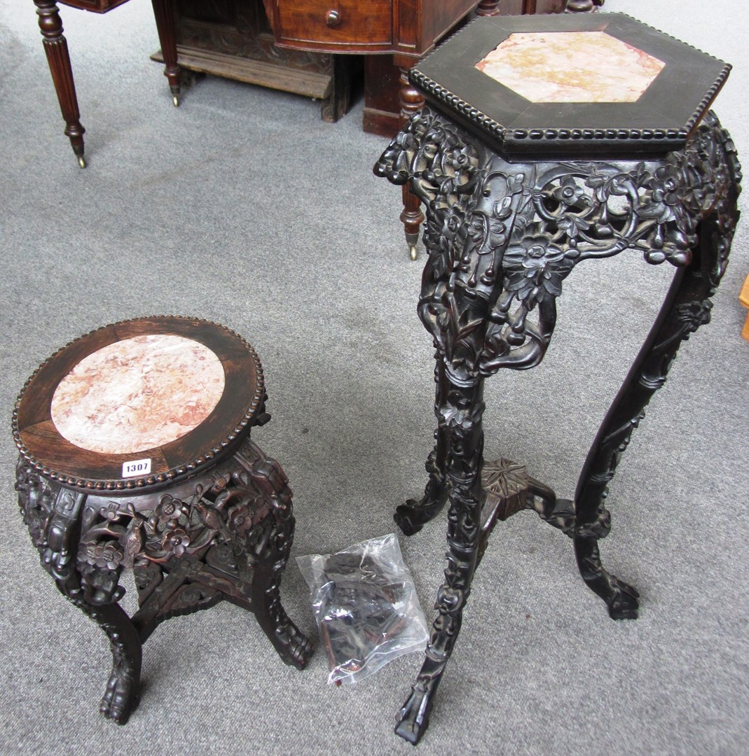 Appraisal: A late th century Chinese marble top carved hardwood urn