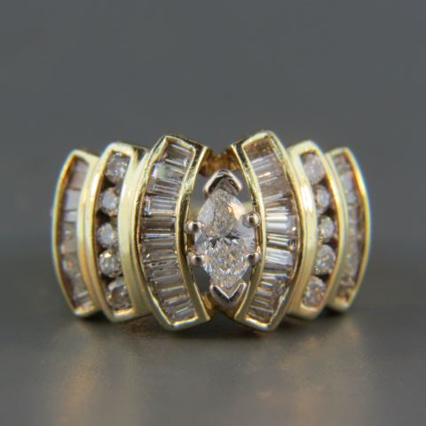 Appraisal: Diamond Ring carat marquise with round baguette diamonds in k