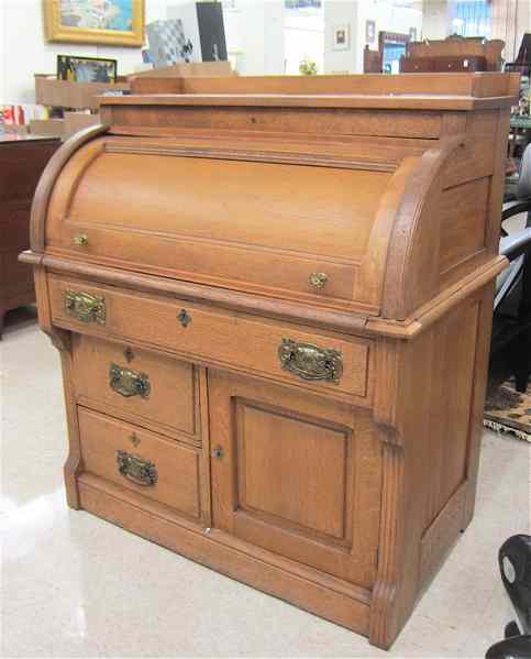 Appraisal: VICTORIAN OAK AND WALNUT CYLINDER-ROLL DESK American c the cylinder