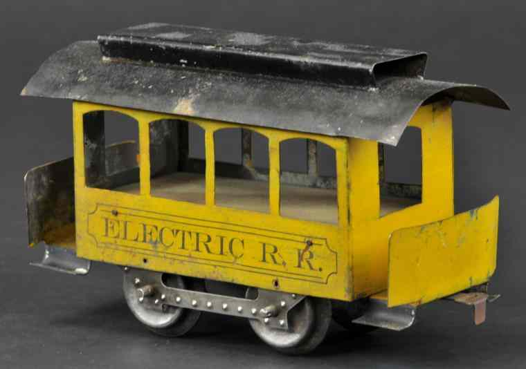 Appraisal: HOWARD UNPOWERED TROLLEY TRAILER Tin trolley painted in yellow reads