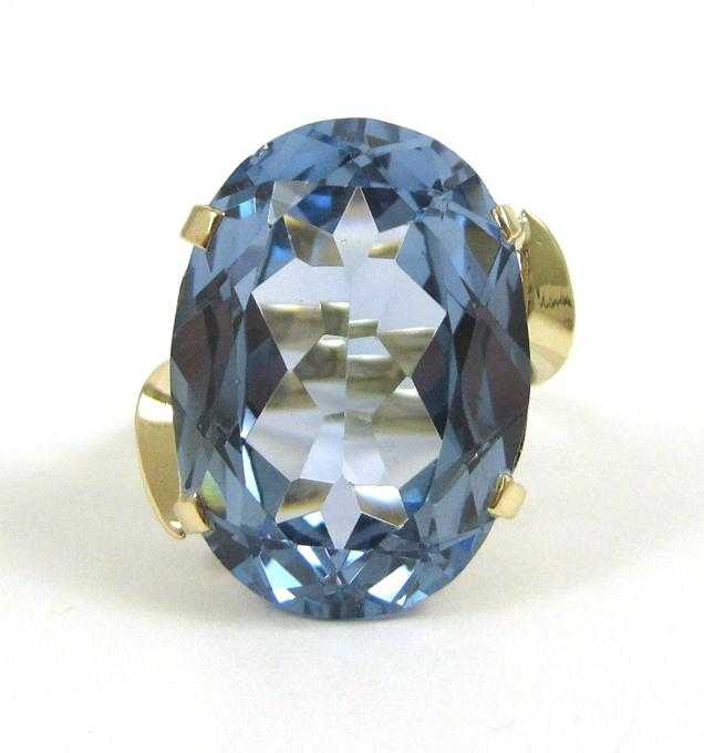 Appraisal: BLUE TOPAZ AND FOURTEEN KARAT GOLD RING set with a