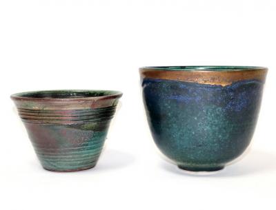 Appraisal: A blue-green glaze bowl with bronzed banding to rim of