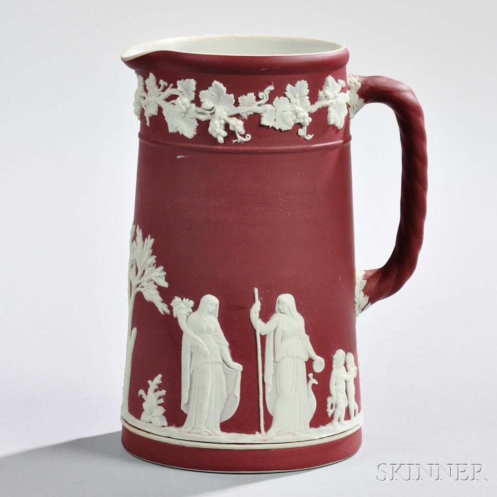 Appraisal: Wedgwood Crimson Jasper Dip Tall Jug England c slightly tapering