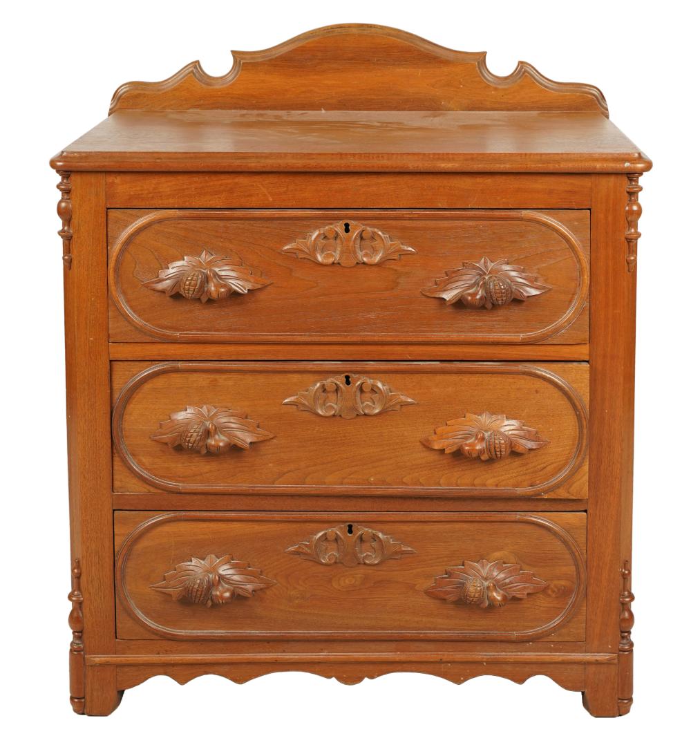 Appraisal: CARVED THREE-DRAWER CHESTlate th century inches wide inches deep inches