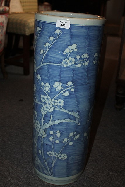 Appraisal: A CHINESE CYLINDRICAL STICK STAND decorated with blossom on a