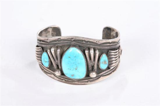 Appraisal: NATIVE AMERICAN CUFF BRACELET Twentieth century Stamped decoration around three