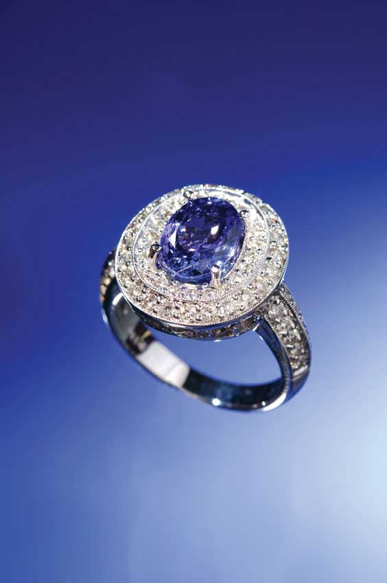 Appraisal: TANZANITE AND DIAMOND RING Ladies tanzanite and diamond ring set