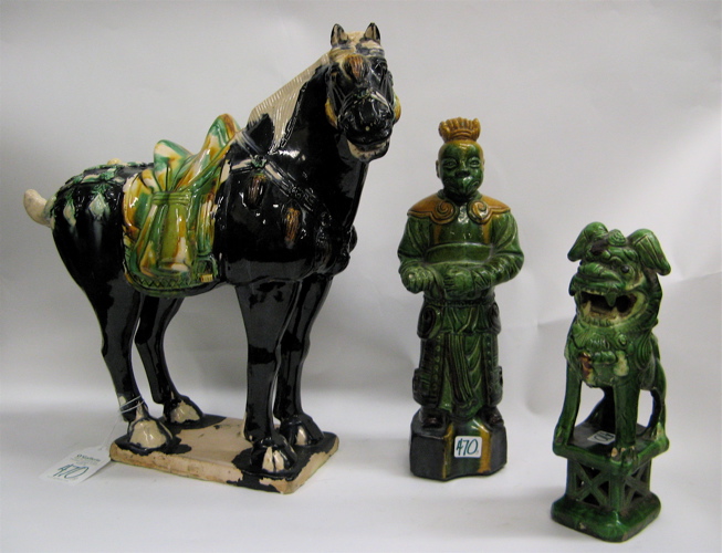 Appraisal: THREE CHINESE GLAZED POTTERY FIGURES Tang style horse deep blue