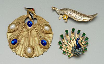 Appraisal: Three peacock costume brooches one blue and green on gold