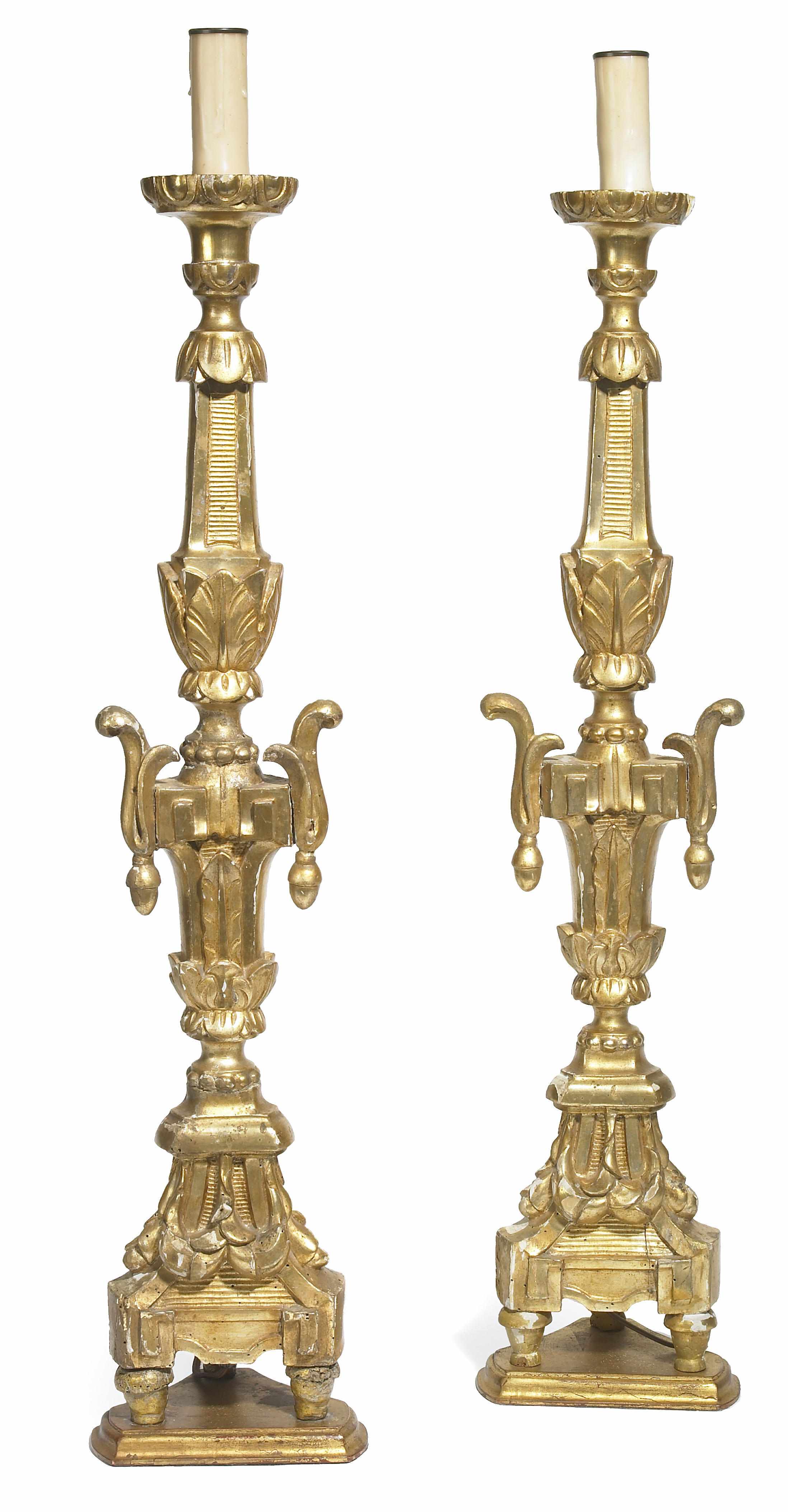 Appraisal: A pair of Italian Neoclassical style giltwood table lamps height