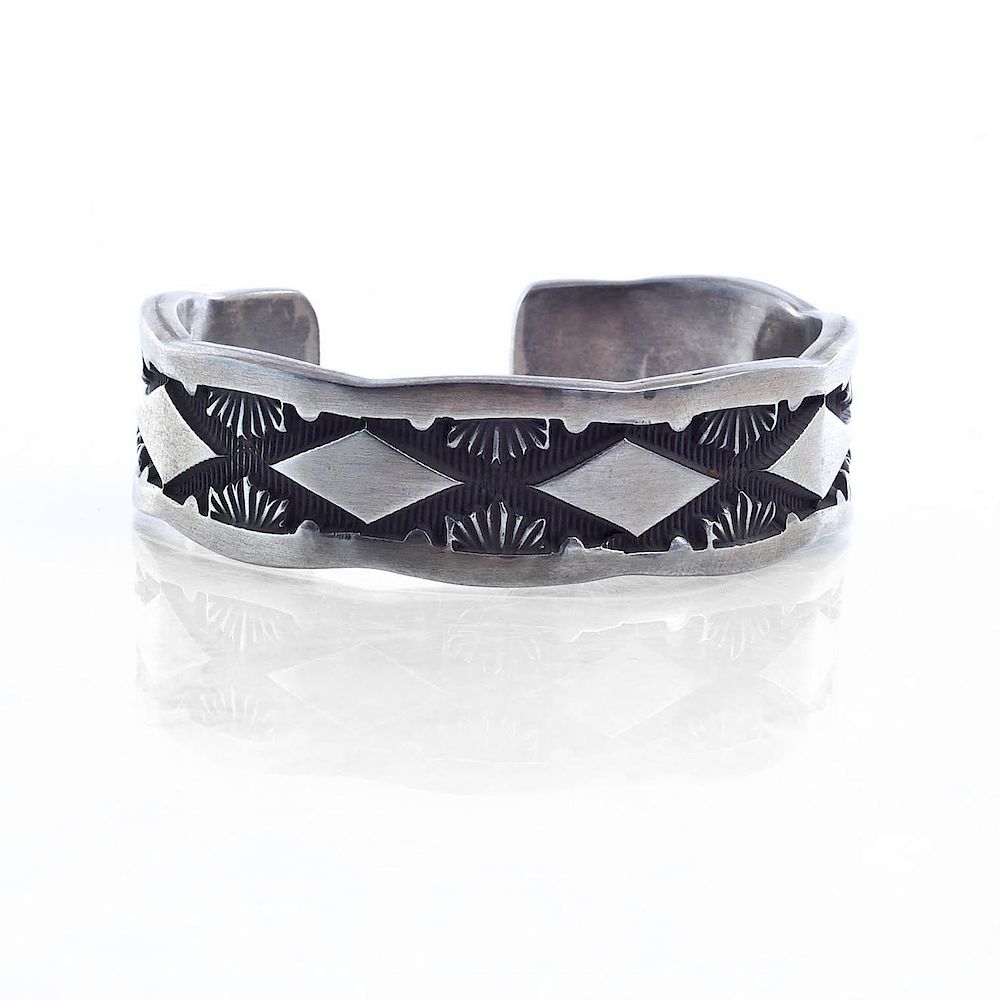 Appraisal: NORA TAHE BILL NAVAJO STERLING SILVER BRACELET Cuff bracelet with