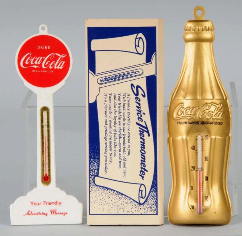 Appraisal: Lot of Coca-Cola Thermometers Description s Includes one metal bottle