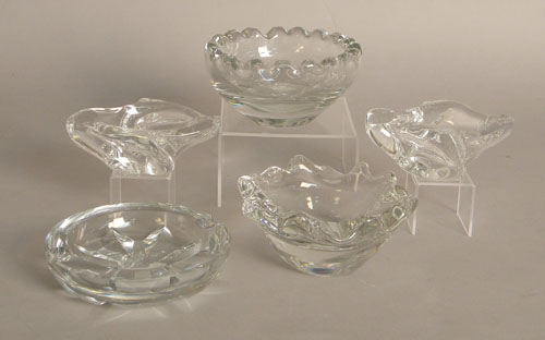 Appraisal: Four Daum Nancy colorless glass bowls th c engraved Daum