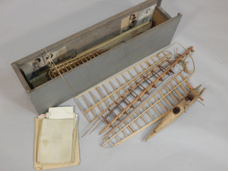 Appraisal: A part made balsa model of an aeroplane with plans