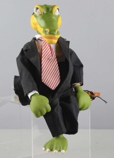 Appraisal: Suited Alligator Plaster Marionette This marionette is wearing a black