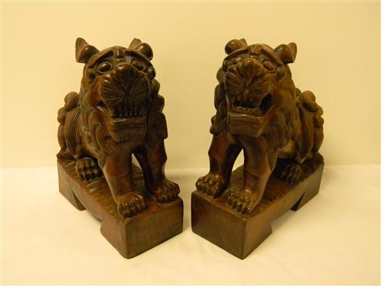 Appraisal: Pair carved wooden foo dogs c '' high including bases