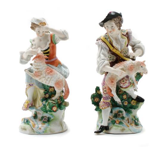 Appraisal: A Pair of Chelsea Style Porcelain Figural Groups depicting a